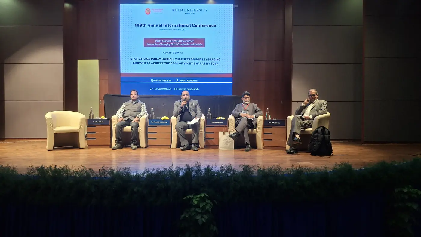 Speakers addressing an Indian Economic Association conference